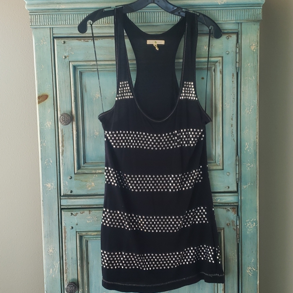 Flirty fun Hip length tank with detail